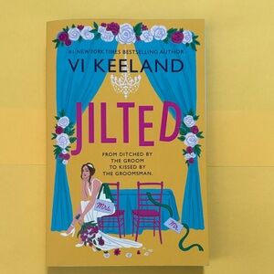 Jilted by Vi Keeland. Blue sprayed edges. New.